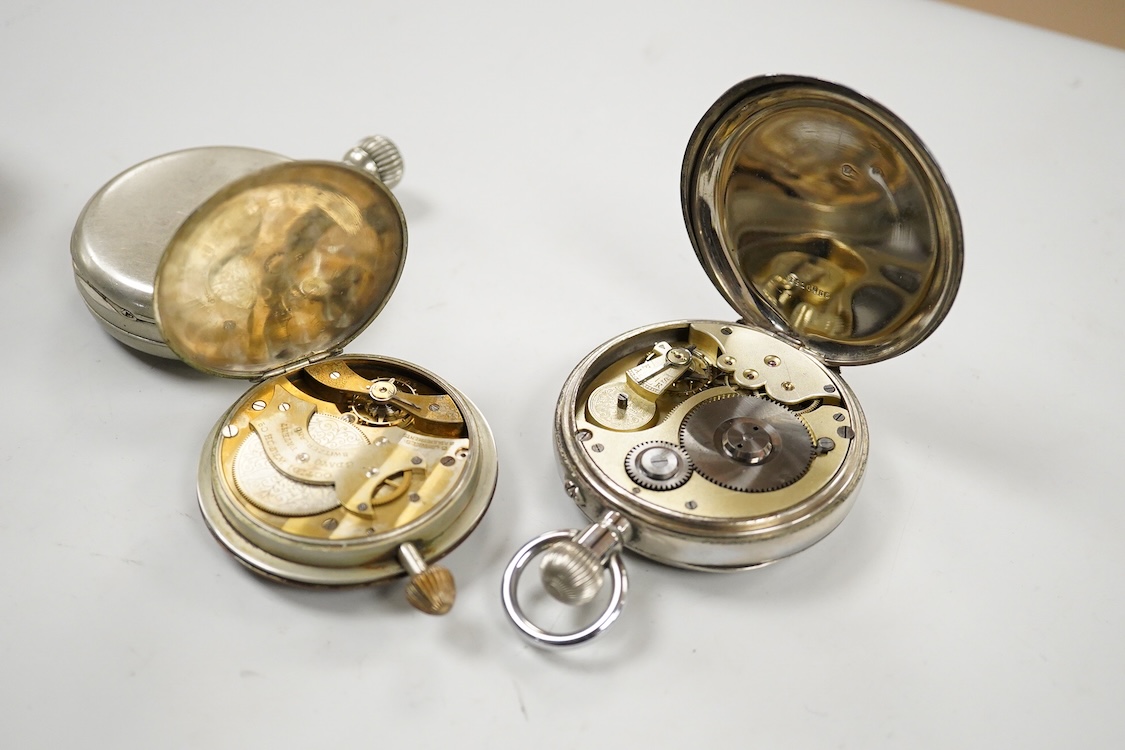 An erotic globe watch, a base metal open faced 8 day keyless pocket watch and two car dashboard clocks including Glo-Worm, largest case diameter 66mm.